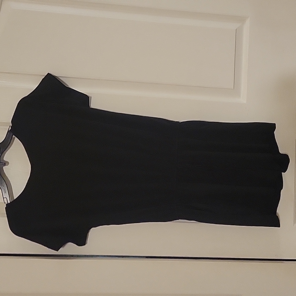 Women's Black Romper in a medium size.  New. Stretchy.